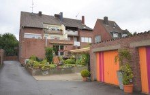 R�ckansicht, Garagen Kapitalanlage - Mehrfamilienhaus mit Ladenlokal in zentraler Lage von H�ckelhoven
